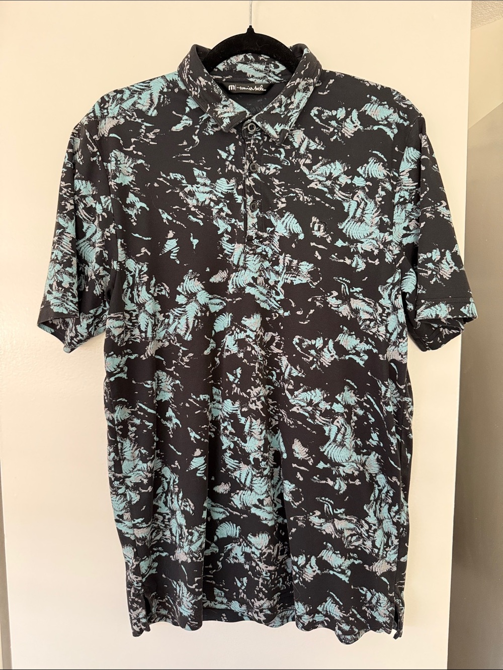 Travis Mathew Black Polo with Aqua Abstract Print